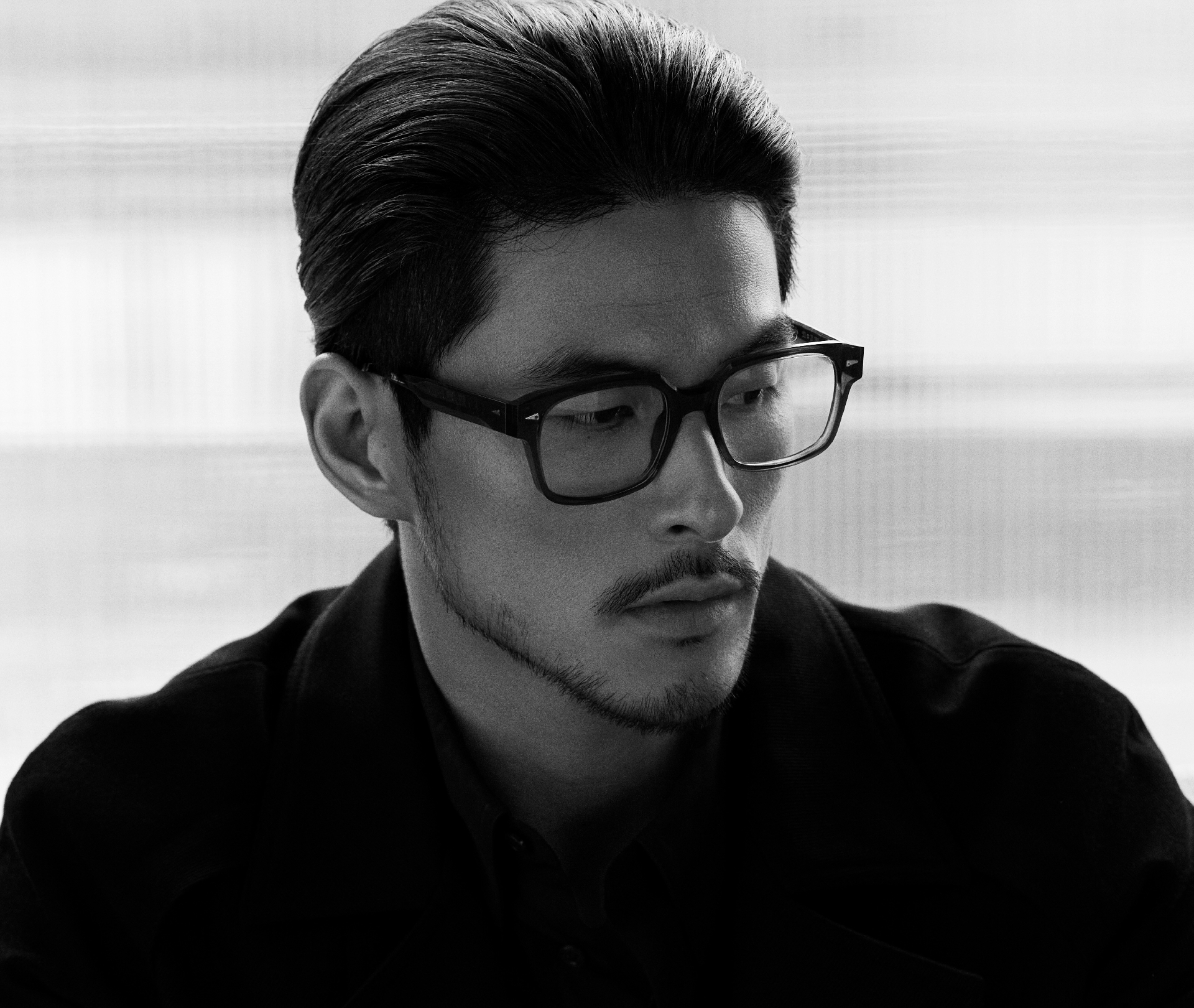 Model wearing oversized acetate sunglasses